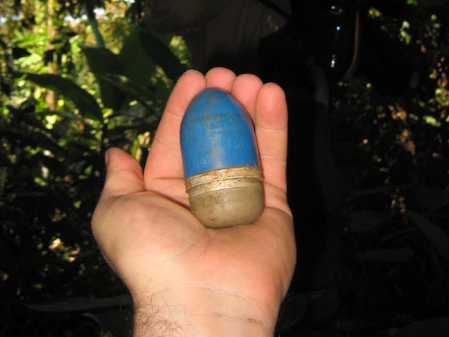 Proof of US presence on Coiba? A 40mm training grenade for use with an American M-203 grenade launcher, found on a hillside near the Playa Hermosa base. Picture: Chuck Holton
