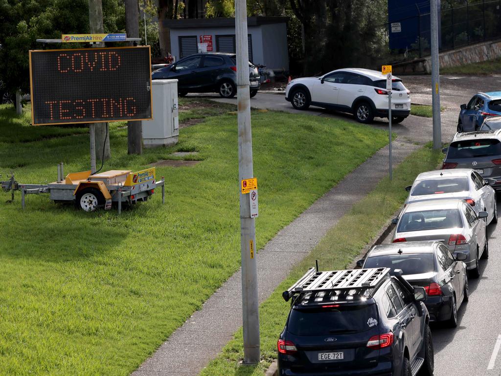 The state recorded 63,018 new Covid-19 cases, including 37,938 rapid antigen test results on Friday while cars line up at the drive through Covid-19 testing site in Ryde. Picture: NCA NewsWire / Damian Shaw