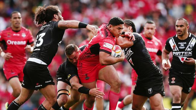 Jason Taumalolo on the charge for Tonga.