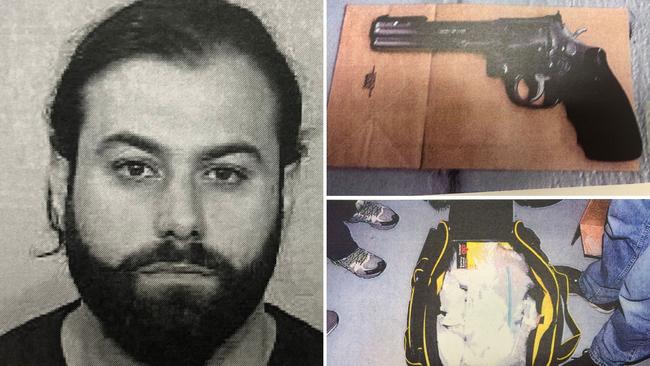 Makdissi with one on the firearms and bags of drugs found at his home