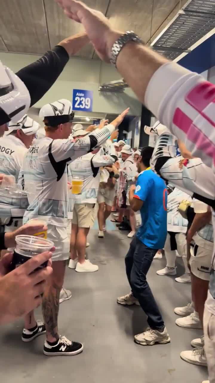 Cricket fans still having fun despite rain at the Gabba