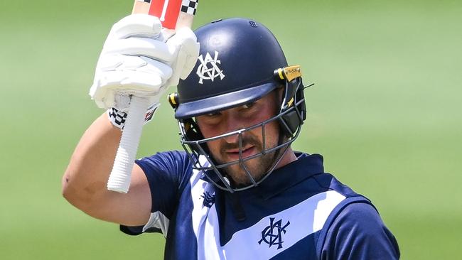 Jonathan Merlo celebrates making his half century against South Australia. (Photo by Mark Brake/Getty Images)