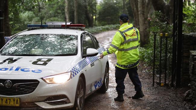 Police guarding the entrance to a property in the Blue Mountains on Wednesday. Picture: NCA NewsWire / David Swift