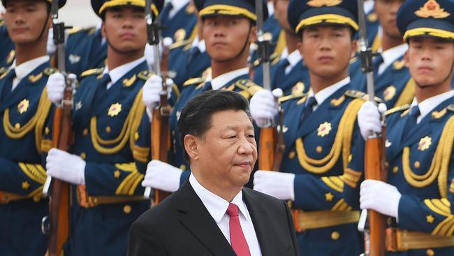 President Xi Jinping inspects his troops outside the Great Hall of the People in Beijing. Picture: AFP