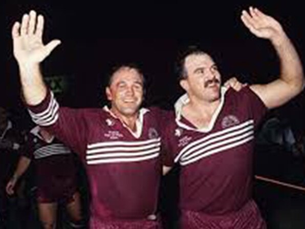 Martin Bella (right) with fellow Maroons legend Gary Coyne