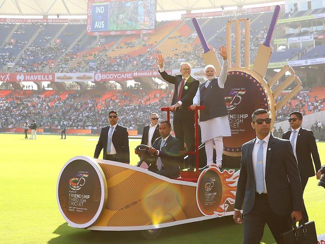 Anthony Albanese and Indian Prime Minister Narendra Modi riding on the cricket-themed golf cart. Picture: Getty