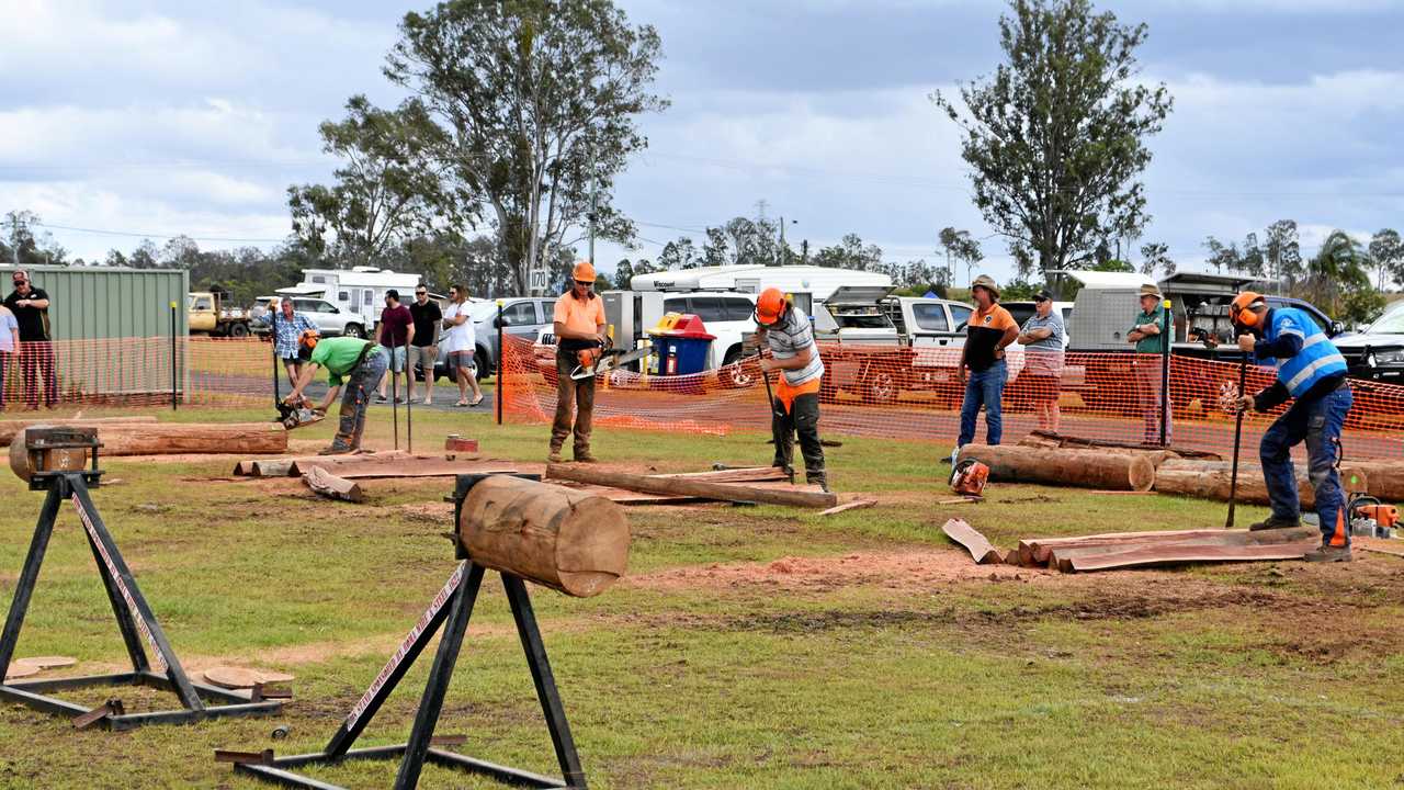 Tom Wheeler, Cameron Wakefield, Mitch Bennet, Graham Brown, Isaac Wakefield and Bryan Brown in the chainsaw race. Picture: Arthur Gorrie