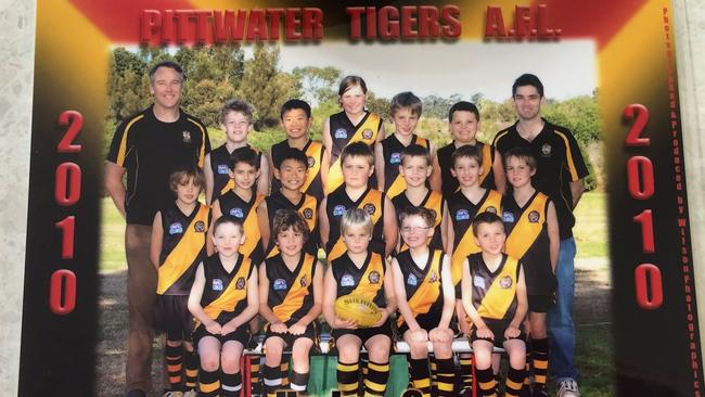 Sydney Swans player Alice Mitchell and her Pittwater Tigers team