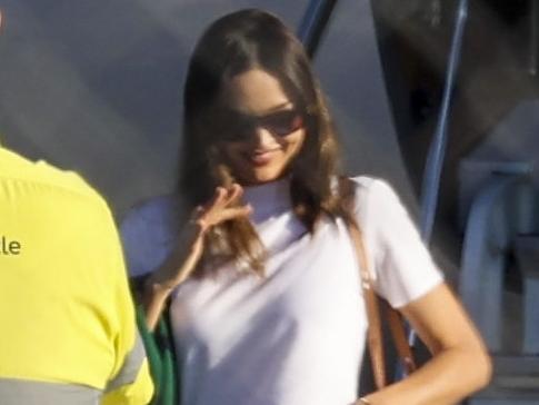***DAILY TELEGRAPH ONLY*** FEE WARNING***, MEDIA MODE// EXC// Miranda Kerr and Evan Speigel make a low-key international arrival at Newcastle Airport, flying in from Los Angeles to Williamstown Airport, Picture: Media Mode