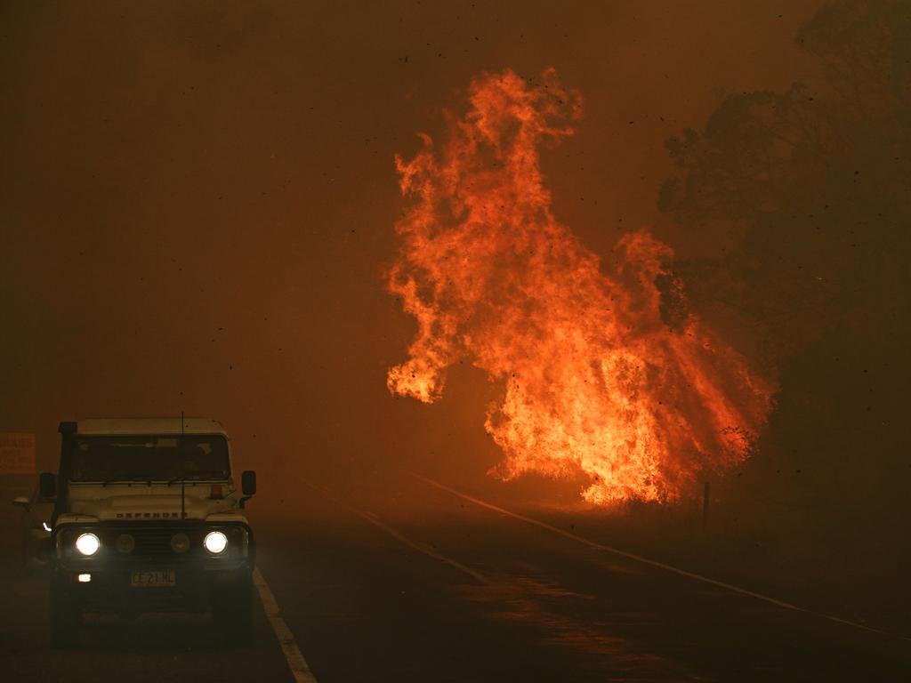 Fire blazes on Bells line of Road in Bilpin as emergence level fires are issued on 19th of December 2019. Picture: Adam Yip