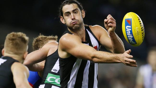 Brodie Grundy is effectively an extra midfielder for the Magpies. Pictures: Michael Klein