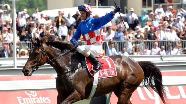 Glen Boss celebrates after Makybe Diva’s third Cup win in 2005.