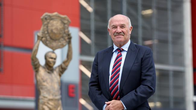 NRL legend Wally Lewis with his statue at Suncorp Stadium. Picture: Tara Croser.