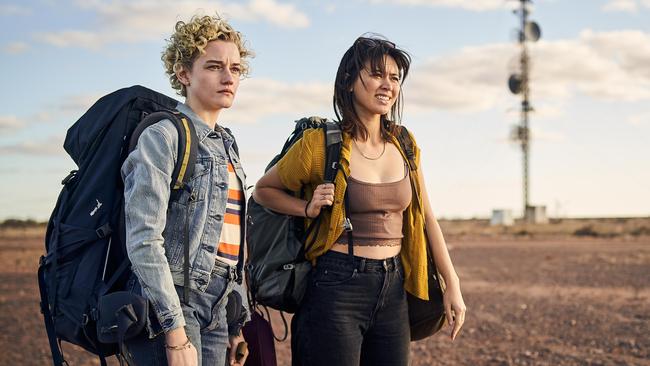 Julia Garner, Jessica Henwick in a scene from the Aussie Outback drama The Royal Hotel.