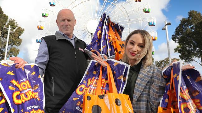 Phil Sims and Polly Love of Robern Menz with stacks of Menz showbags they don’t quite know what to do with after the Royal Adelaide Show was cancelled for the second year running. Picture Dean Martin