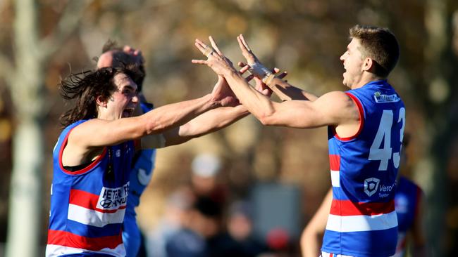 Matthew Neagle and Jackson Kelly celebrate a goal during a SANFL game in 2019. Picture: Kelly Barnes