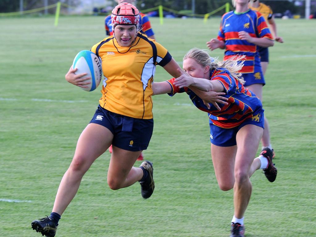 Taleah Ackland takes on the Downlands defence. Picture: DANIEL LAFARGA/CONTRIBUTED