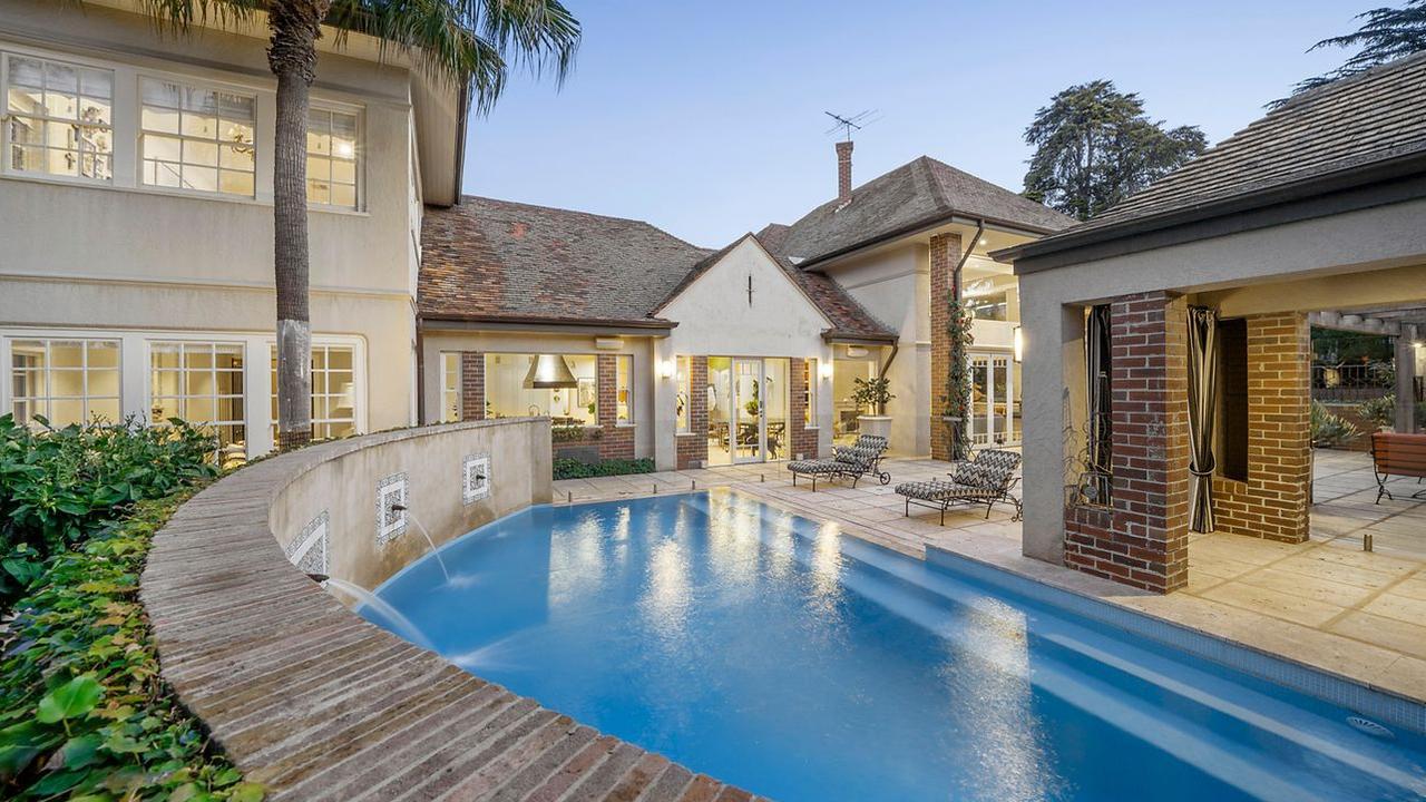 A luxe swimming pool is just one of many outdoor features.