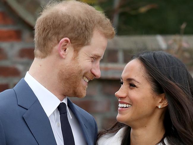 LONDON, ENGLAND - NOVEMBER 27:  Prince Harry and actress Meghan Markle during an official photocall to announce their engagement at The Sunken Gardens at Kensington Palace on November 27, 2017 in London, England.  Prince Harry and Meghan Markle have been a couple officially since November 2016 and are due to marry in Spring 2018.  (Photo by Chris Jackson/Chris Jackson/Getty Images)
