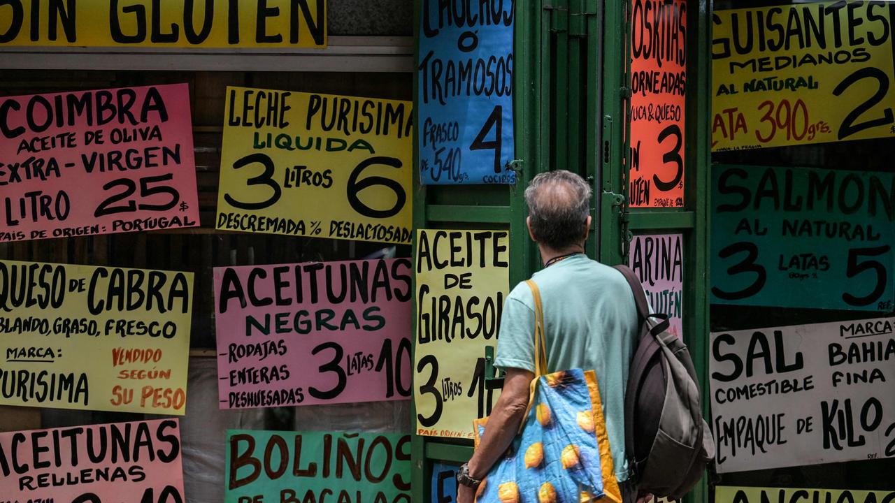 A man wandering the streets of Caracas in Venezuela, which has received a renewed ‘Do Not Travel’ warning. Picture: Juan BARRETO / AFP.