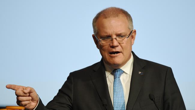 Desert island risks: Treasurer Scott Morrison has a stark warning on Trump’s push to slash corporate tax in the US. Picture: AAP