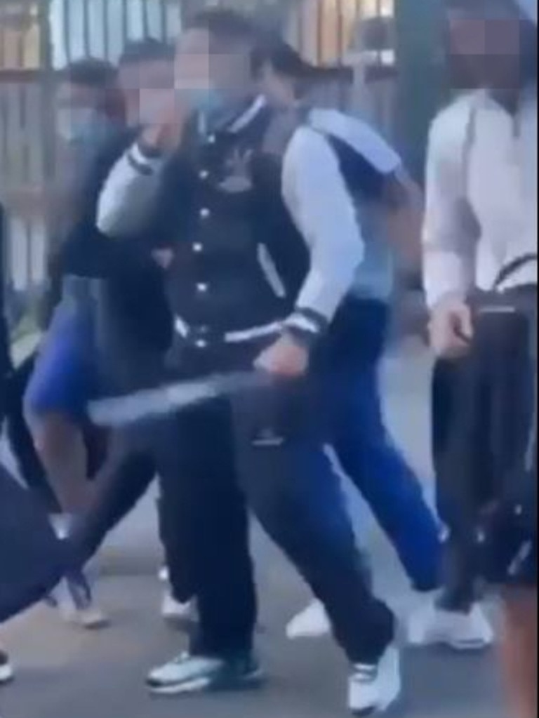 Teens have been caught on video wielding massive weapons as they faced off with rivals at a train station in Sydney’s west. Picture: Supplied