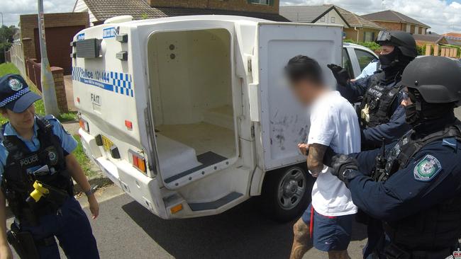 Two revolvers, cash and 1kg of ‘ice’ were seized. Picture: NSW Police