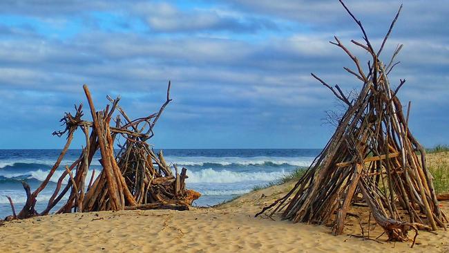 Driftwood huts at Urunga, snapped by Bronwyn Hawkes.