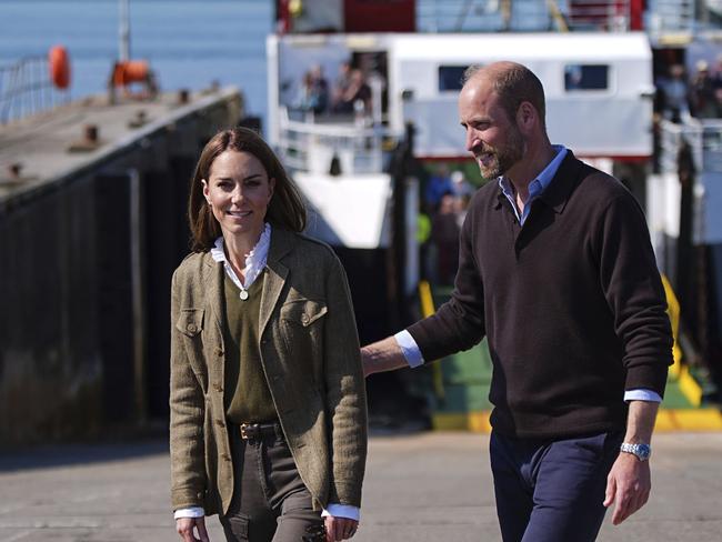 They arrived back at the ferry port after a visit to the Isle of Iona. Picture: Aaron Chown/PA via AP