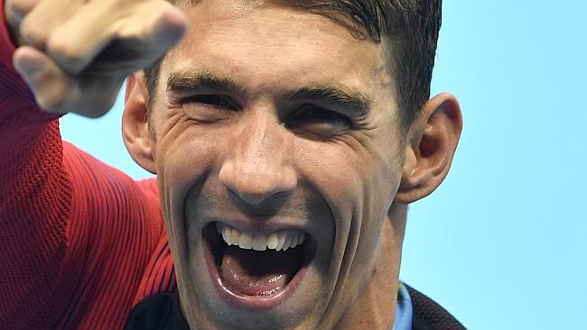 United States' Michael Phelps celebrates after winning the gold medal in the men's 4x100-metre final..