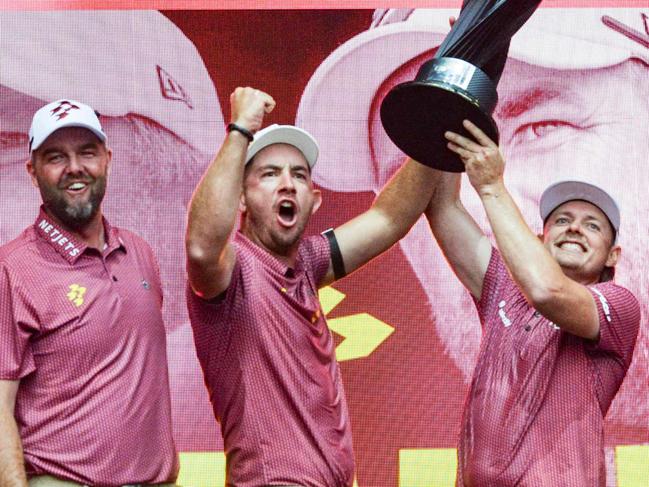 (L-R) Australia's Marc Leishman, Lucas Herbert, Cameron Smith, and Matt Jones of Ripper GC celebrate winning the team competition after the final round of LIV Golf Adelaide at the Grange Golf Club in Adelaide on April 28, 2024. (Photo by Brenton Edwards / AFP) / -- IMAGE RESTRICTED TO EDITORIAL USE - STRICTLY NO COMMERCIAL USE --