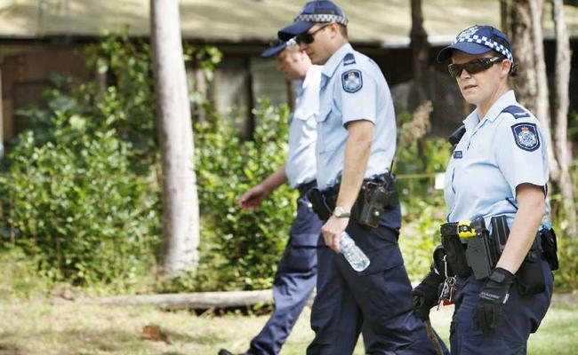 Police search for clues at Mt Crosby near where the body of Allison Baden-Clay was discovered on Monday.