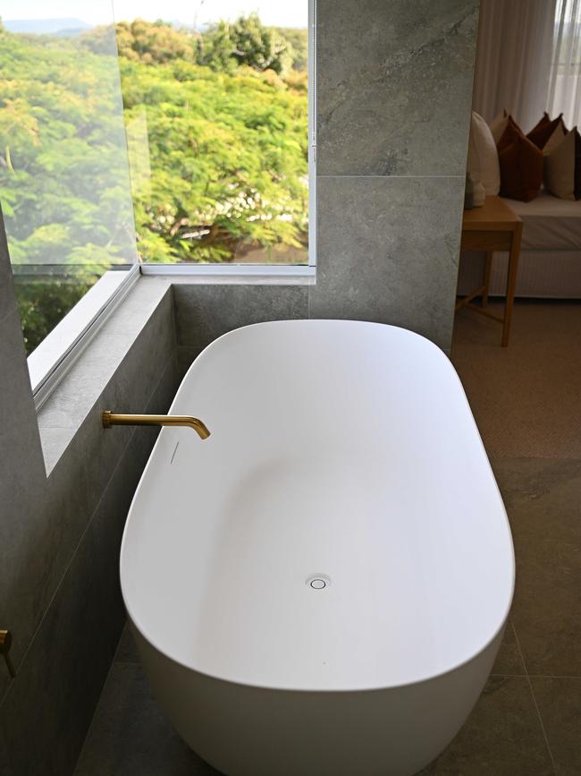 The bath has full views of the treetops. Picture: Lyndon Mechielsen