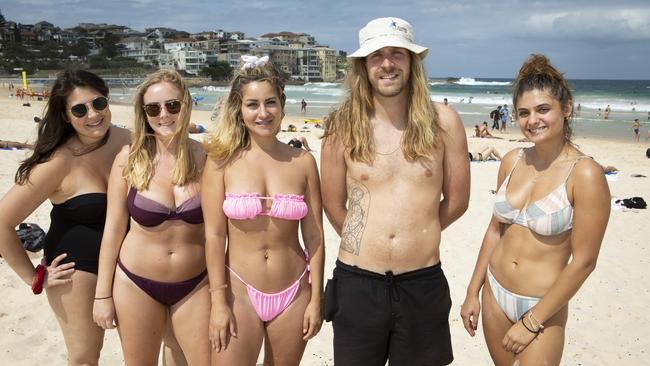 L-R: Beachgoers Emma Pimto, Sammy Baxter, Holly Guswell, Max Plumell and Victoria Kiomall were disappointed with the decision to close Bondi Beach on Saturday. Picture: Brendan Read