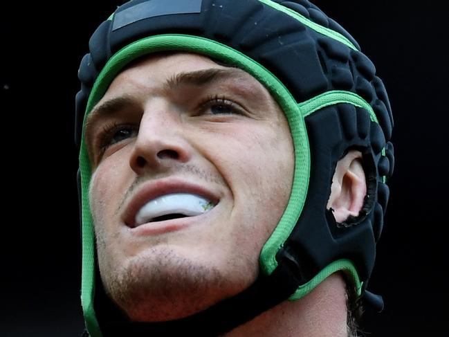 Angus Brayshaw of the Demons takes off his helmet after losing the mens AFL Round 23 Collingwood Magpies and Melbourne Demons match at the MCG in Melbourne, Saturday, August 26, 2017. (AAP Image/Tracey Nearmy) NO ARCHIVING,