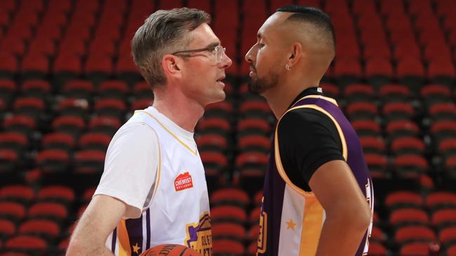 Kyrgios and NSW Premier Dominic Perrottet face off before tip-off. Picture: John Feder