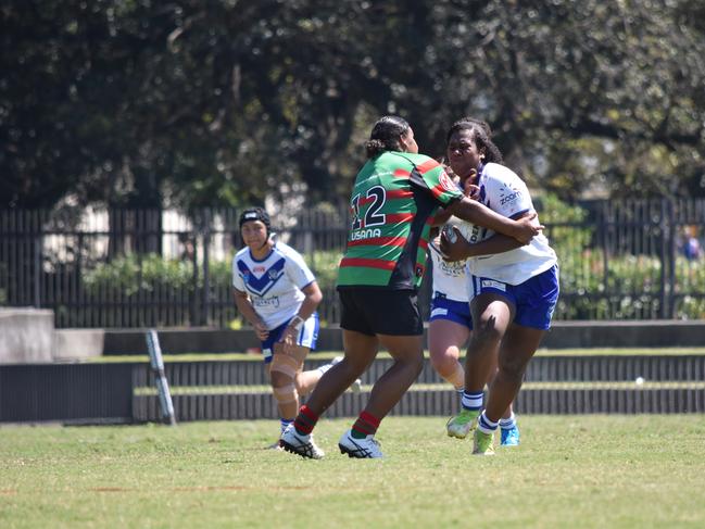 Yillara Widders tackles Ilisapeci Bari. Picture: Sean Teuma/NewsLocal