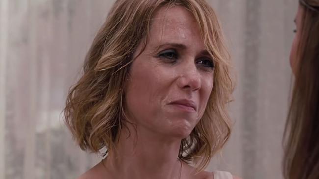 Kristen Wiig’s character did her best to pretend she wasn’t sick.