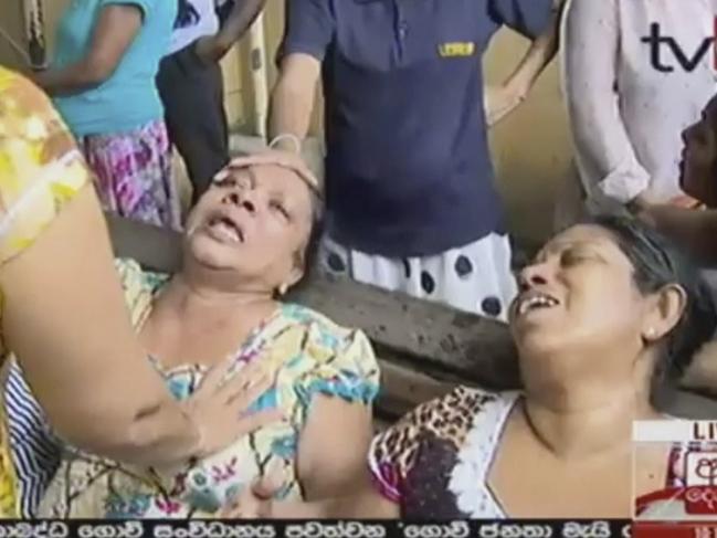 Women in despair after an explosion in Colombo. Picture: Derena TV via AP