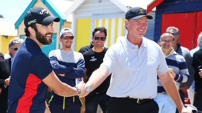 Jordan Lewis with Ernie Els at Brighton Beach to promote next year’s Presidents Cup. Picture: Getty Images