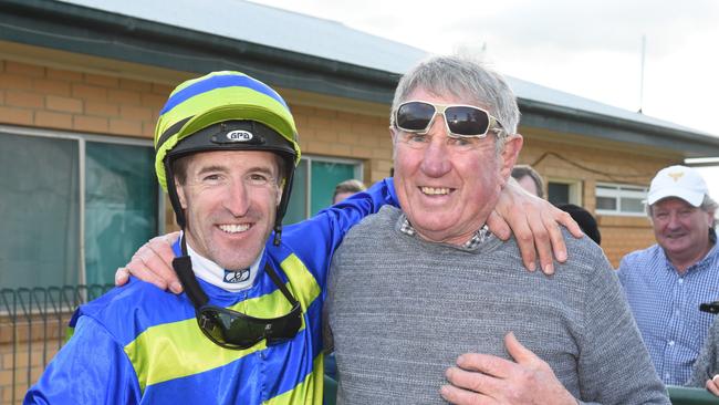 Shayne Cahill celebrates with Michael O‘Leary after winning the Di Giorgio Family Wines 2018 Apsley Cup at Edenhope Racecourse. Picture: Todd Nicholson/Racing Photos via Getty Images