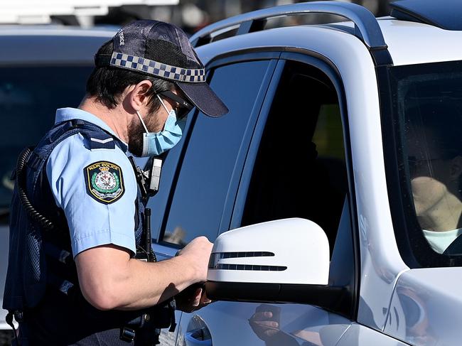 Explainer: New rules for hotspot areas amid record spike in cases