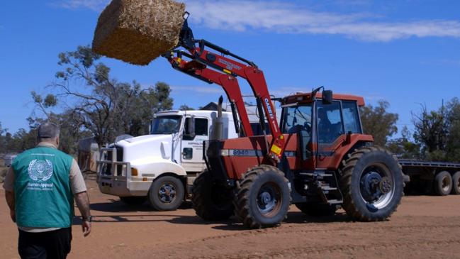 Bales being unloaded for the farmers in Cobar.