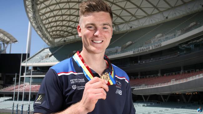 Central District’s Harry Grant with his Magarey Medal at Adelaide Oval. Picture: Dean Martin