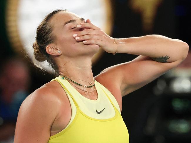 Belarus' Aryna Sabalenka celebrates match point against Spain's Paula Badosa during their women's singles semi-final match on day twelve of the Australian Open tennis tournament in Melbourne on January 23, 2025. (Photo by DAVID GRAY / AFP) / -- IMAGE RESTRICTED TO EDITORIAL USE - STRICTLY NO COMMERCIAL USE --