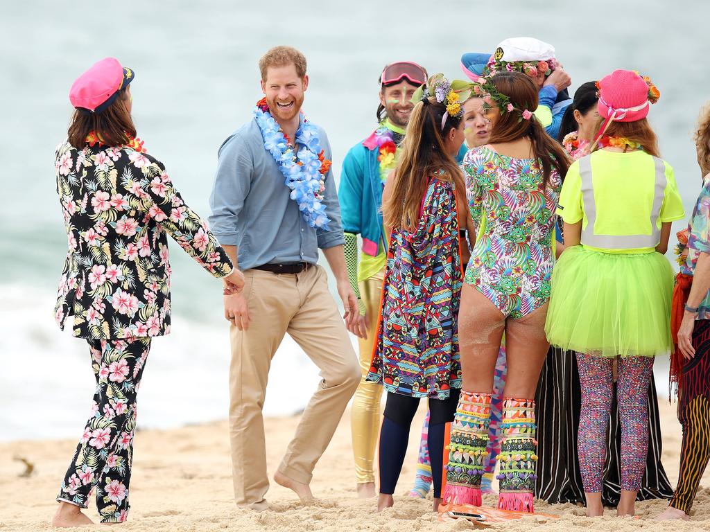 DAILY TELEGRAPH - Pictured is the Duke and Duchess of Sussex, Prince Harry and wife Meghan at Bondi Beach today on their Royal tour of Australia. Picture: Tim Hunter
