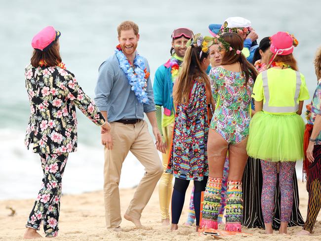 DAILY TELEGRAPH - Pictured is the Duke and Duchess of Sussex, Prince Harry and wife Meghan at Bondi Beach today on their Royal tour of Australia. Picture: Tim Hunter