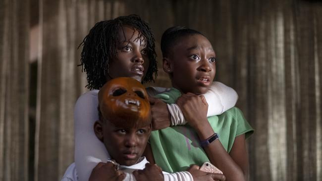 Evan Alex, Lupita Nyong'o and Shahadi Wright Joseph in <i>Us</i>. Picture: UNIVERSAL PICTURES