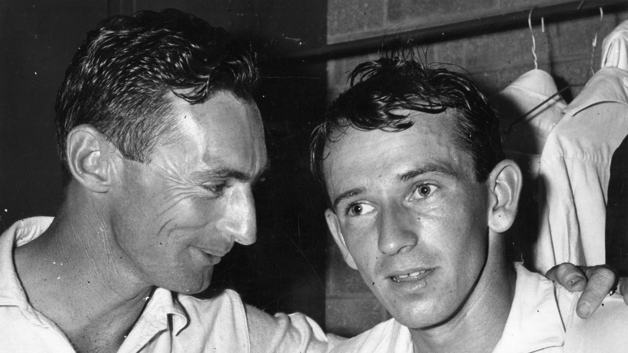 Australian batsman Doug Walters (r) made 119 not out in his Test debut in 1965. Australian Test captain Brian Booth gives Walters a pat on the back and a handshake after he had returned to the pavilion.