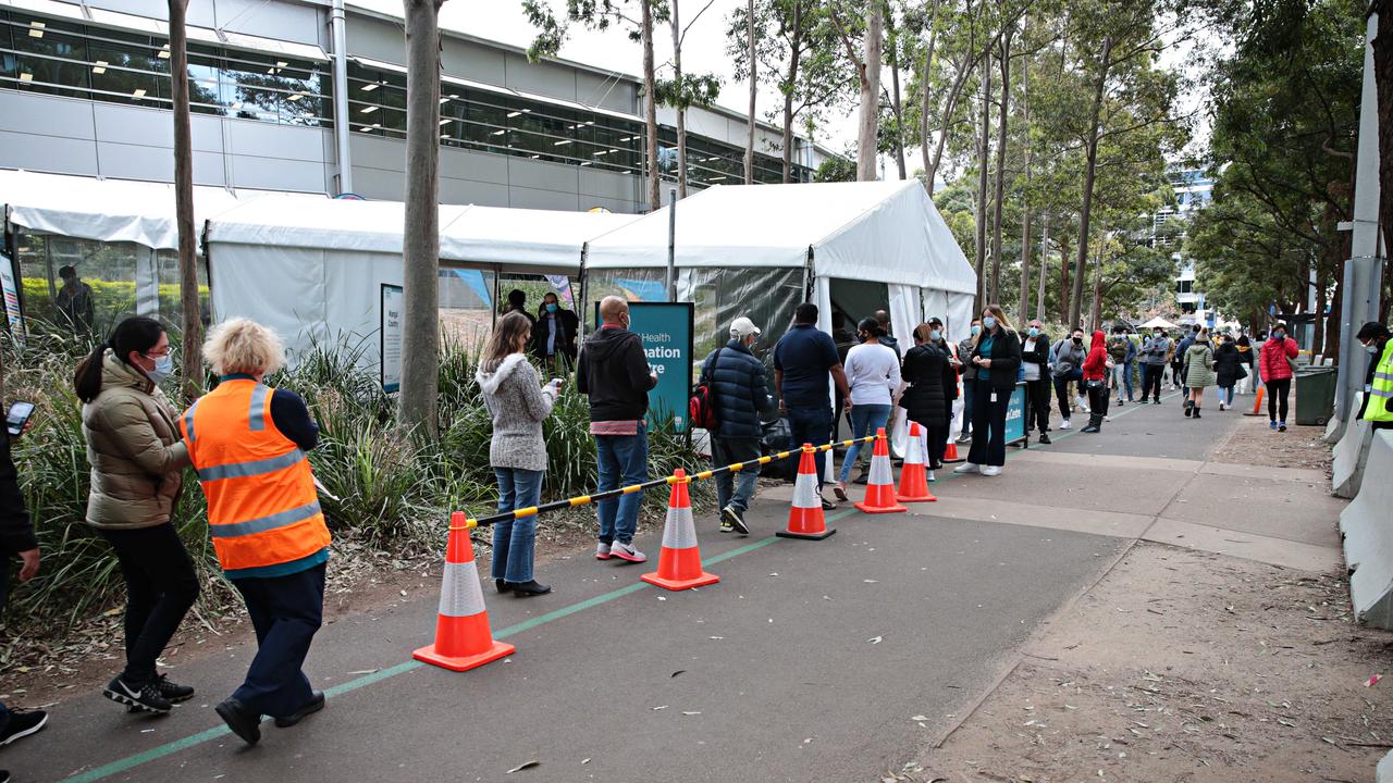 People line up at Sydney's mass vaccination hub in Sydney Olympic Park. Picture: NCA NewsWire / Adam Yip